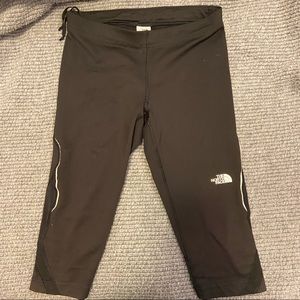 The North Face black 3/4 length athletic pants.